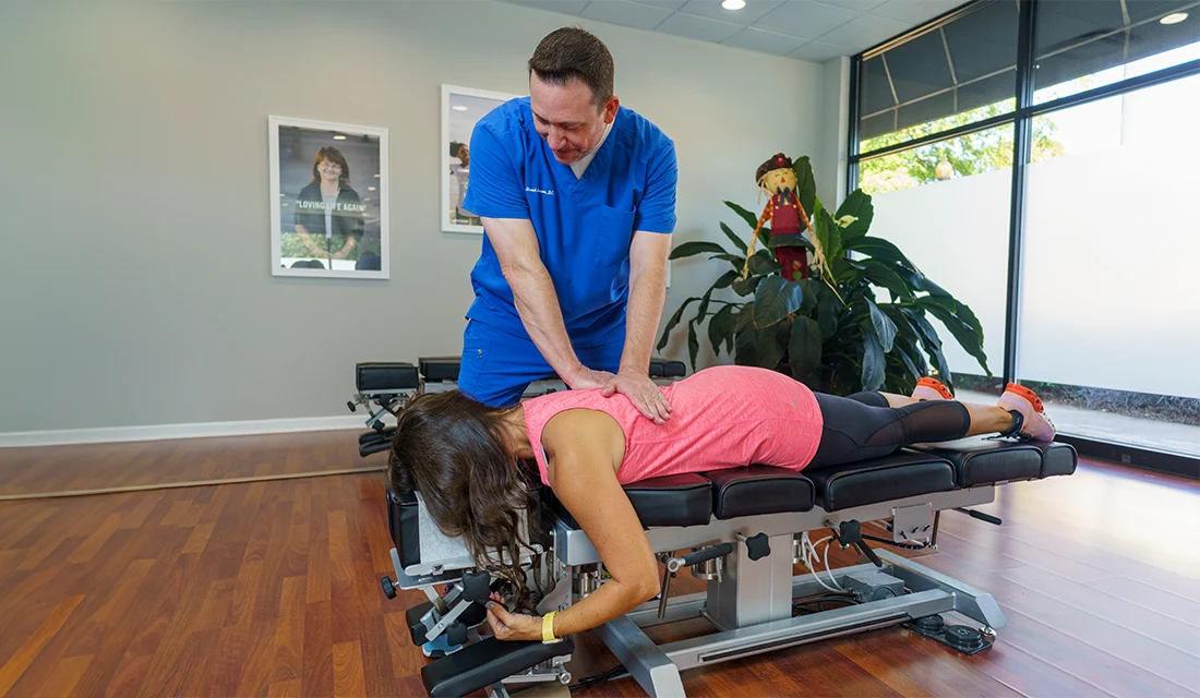 Dr. David Johnson adjusting a patient at Health First Family Chiropractic in Columbus, GA